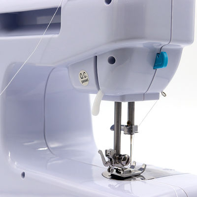 Máquina de costura de botões de camisetas de mão pequena